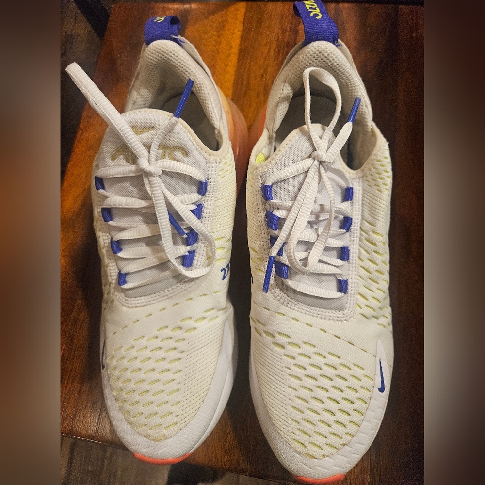Nike Kids White Sneakers with Blue and Yellow Accents and Coral Outsole
